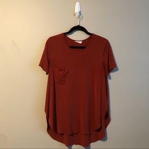 Lush cute top with a chest pocket